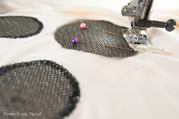 Easy ghost costume tutorial - mesh being sewn on bedsheet. press print party