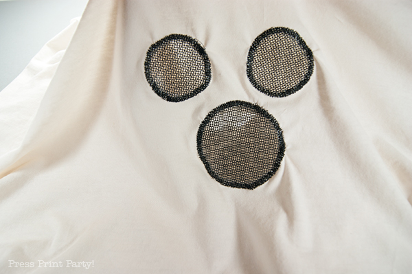 Easy ghost costume tutorial - bedsheet ghost costume face. press print party