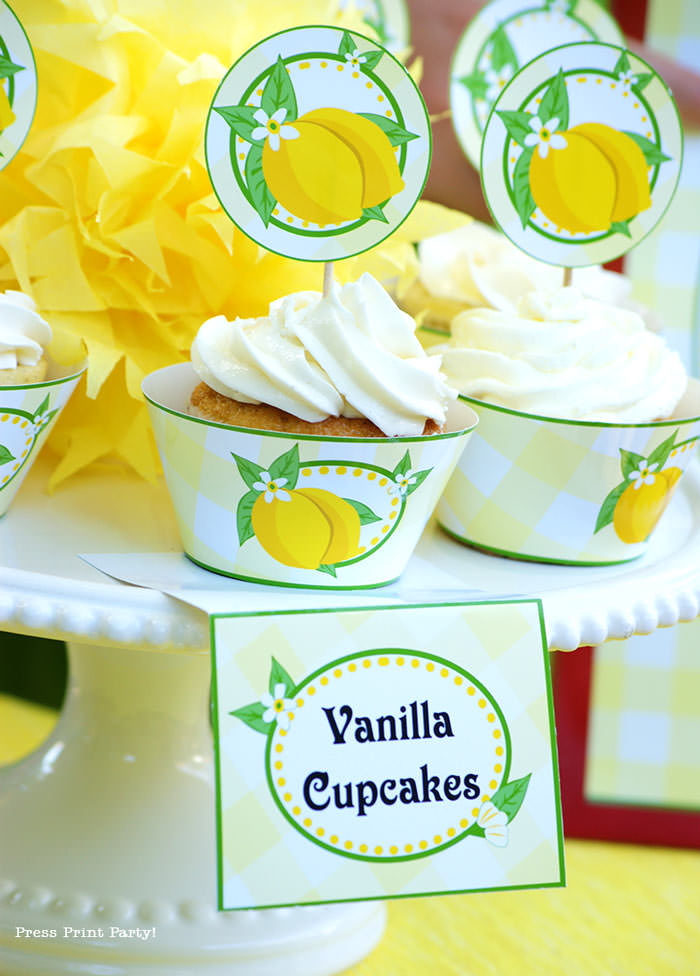 Girls with a lemonade stand. with lemonade banner price list and labels and cupcake wrappers. free printables Press Print Party!