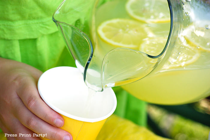 pouring lemonade in glass Press Print Party