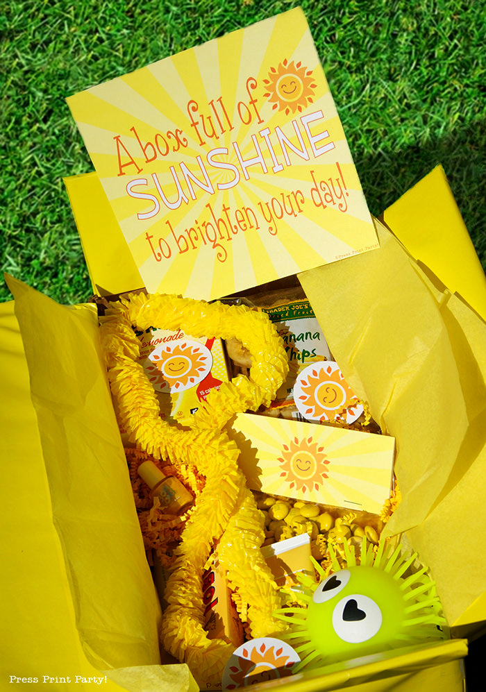 Yellow box with printable happy suns and yellow gifts with text printable sunshine, brighten someone's day.