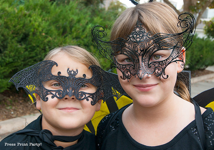 girl in bat mask and girl in butterfly mask - Press Print Party!