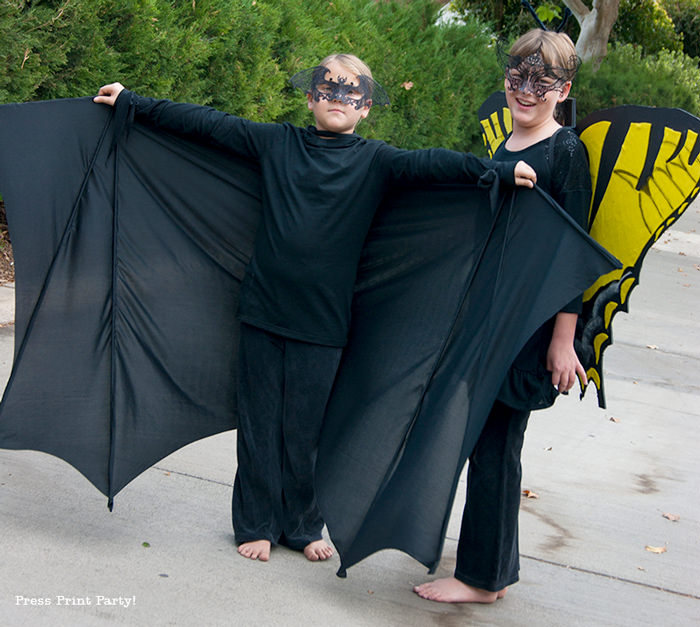 Girl in bat costume and girl in butterfly costume - Press Print Party!