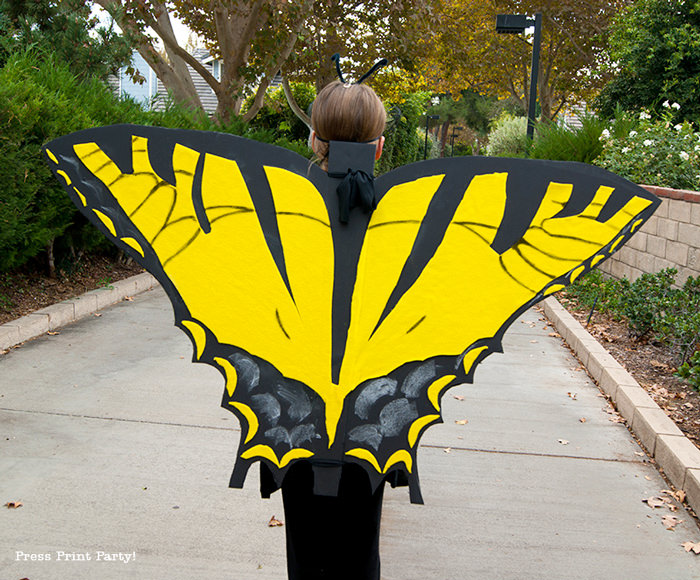 Girl with butterfly costume open wings - Press Print Party!