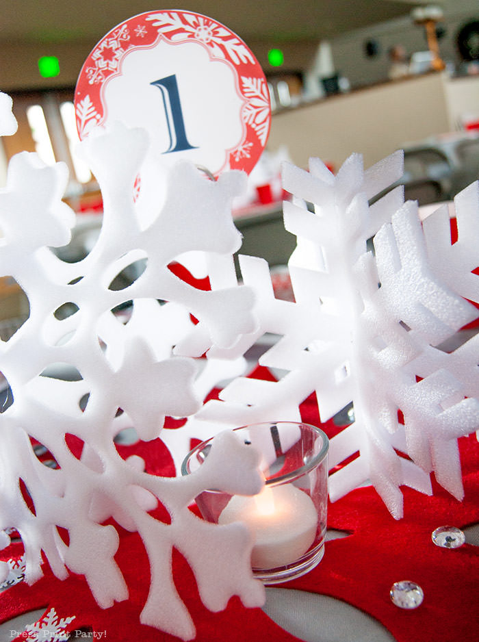 DIY Christmas Centerpiece Ideas red snowflake white foam snowflake on red felt snowflake table number 1 press Print Party!