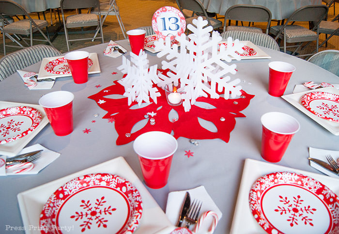 DIY Christmas Centerpiece Ideas red snowflake white foam snowflake on red felt snowflake table number 1 press Print Party!