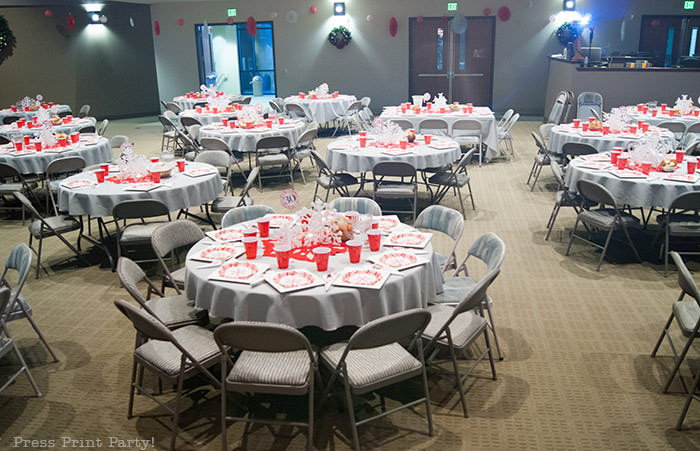 DIY Christmas Centerpiece Ideas red snowflake white foam snowflake on red felt snowflake table numbers Press Print Party!