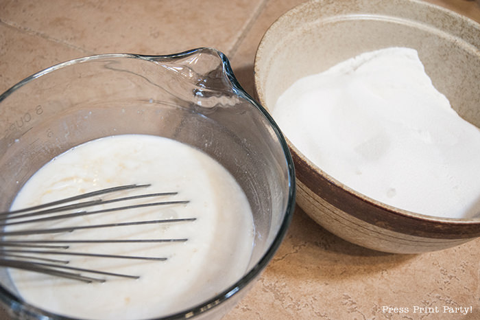 Coconut mochi cake wet and dry ingredients in bowls