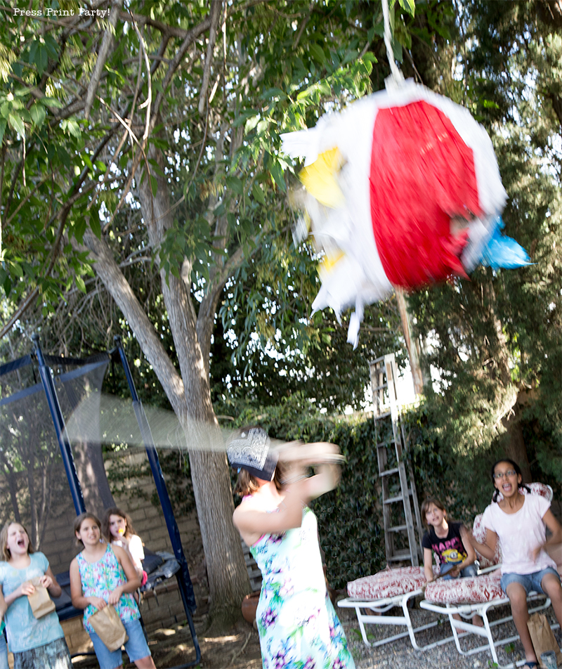 Pool Party Beach Ball Birthday Bash - Ideas and decorations by Press Print Party! Beach ball pinata