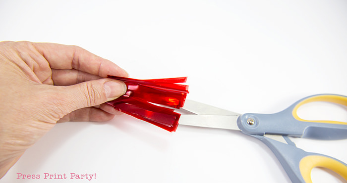 Folding for tassel cupcake toppers.