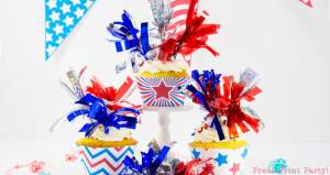3 patriotic cupcakes with fireworks tassels toppers