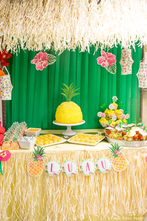 Party like a Pineapple -Tiki hut with dessert table w pineapple cake and cupcakes, pineapple banner and lanterns. Pineapple party - Luau Party - by Press Print Party!