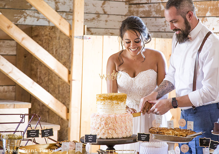 A breathtaking rustic barn wedding - country wedding - Press Print Party! cutting the cake