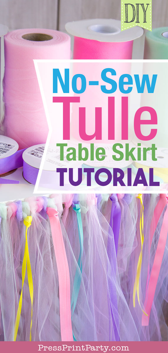 Tulle table skirt with rolls of tulle and ribbons with text