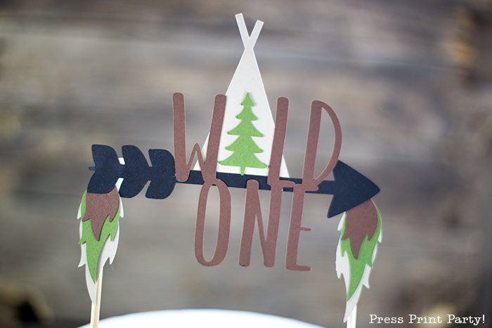 Wild one cake topper make of cut paper