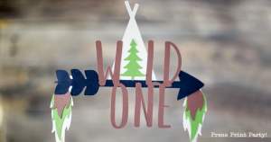 Wild one cake topper make of cut paper