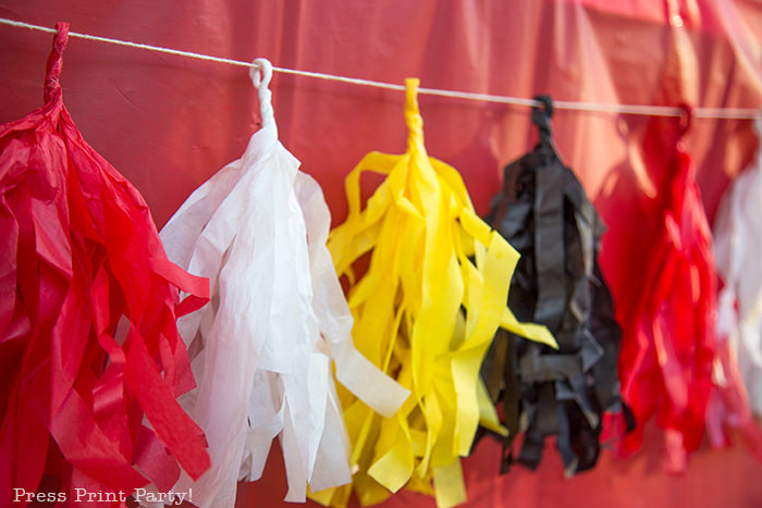 red white, yellow and black tassels for movie night table.