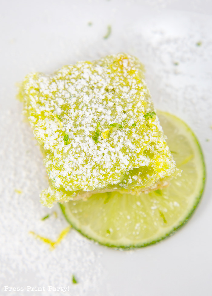 one square of lime bar with lime wedge