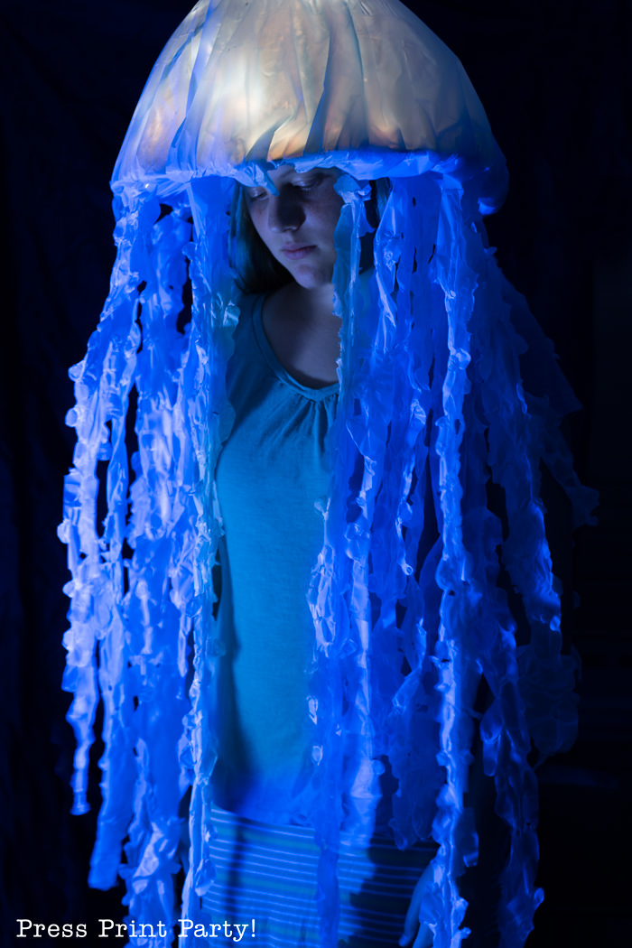 Get ready to shine this Halloween with a stunning bioluminescent jellyfish  costume!