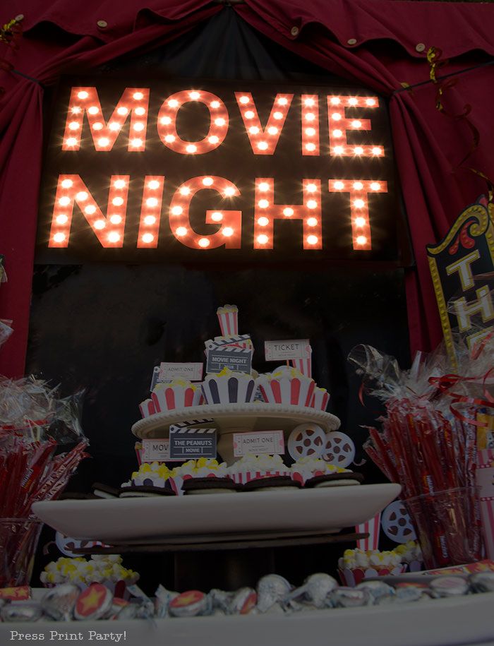 Movie Night lit up theater marquee lights with a tower of cupcakes - Press Print Party!