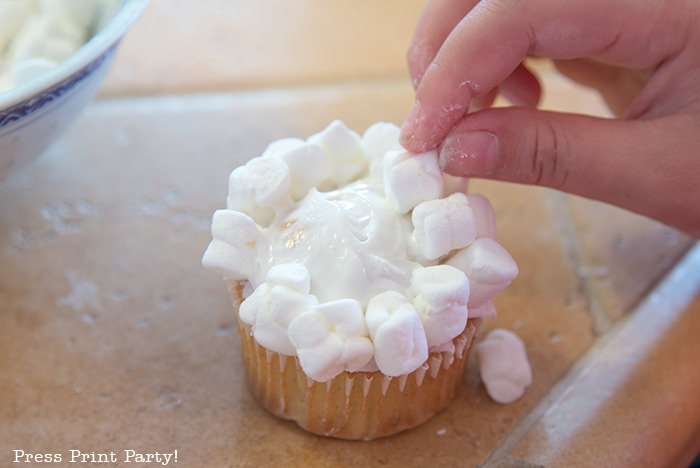 Cupcake with marshmallows on top that looks like popcorn - Press Print Party!