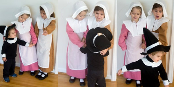 2 girls and a boy in pilgrim outfits