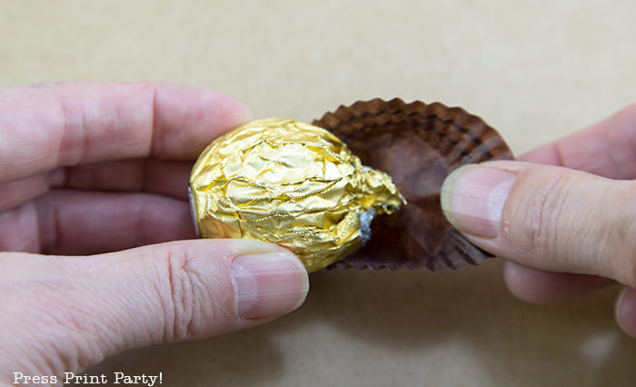 ferrero rocher chocolate craft taking the wrapper off the chocolate