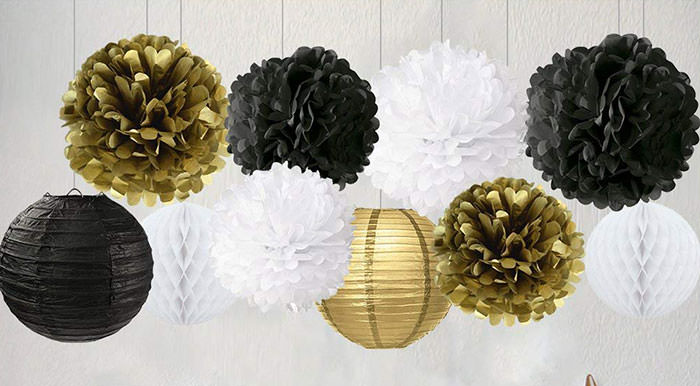white, gold, and black hanging decorations new years