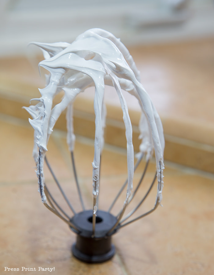 Whisk with white Swiss meringue buttercream frosting - Press Print Party!