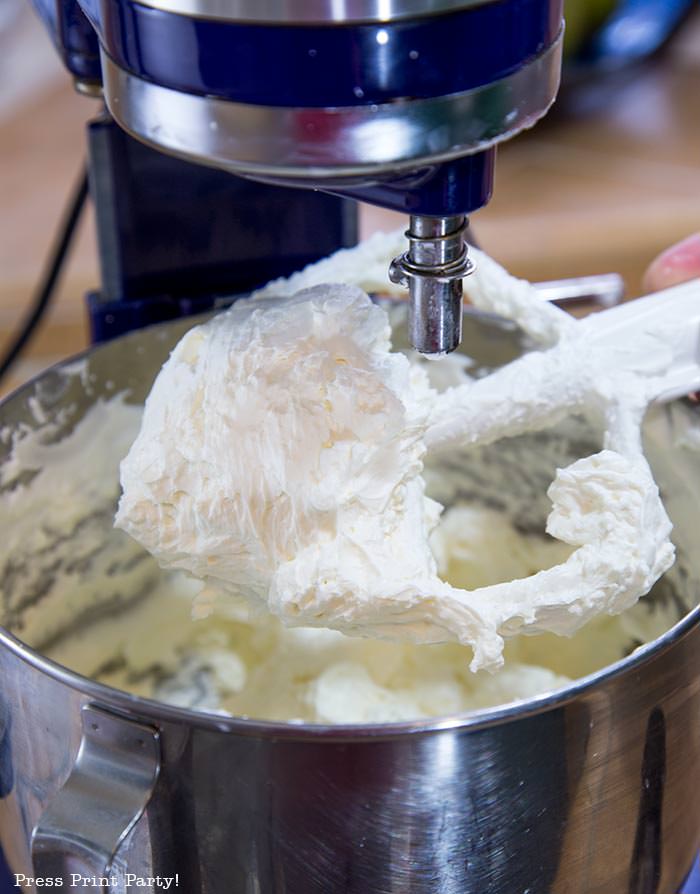 Whisk with white Swiss meringue buttercream frosting - Press Print Party!