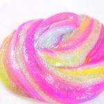 Foolproof slime recipe, striped slime with clear and glitter slime made with glue and contact solution.