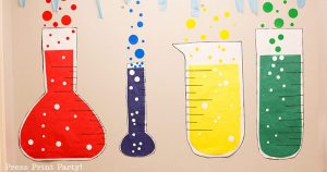 4 giant paper beakers for science party decorations wall backdrop. red, blue, yellow and green with bubbles