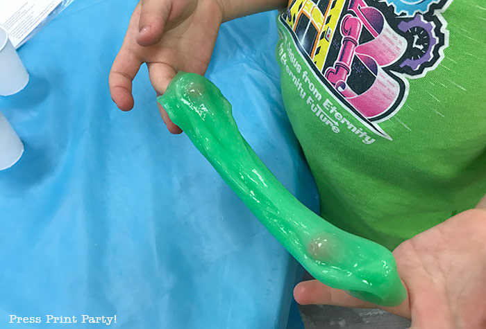 Foolproof Slime green stretching - Science party decoration ideas DIY -Press Print Party!