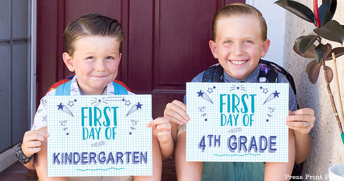 FREE First day of school signs printable - Back to school photo ideas - picture of 2 boys. First day of kindergarten and first day of 4th grade.by Press Print Party!