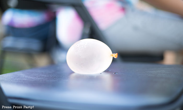 water balloon on chair for musical chairs - classic games