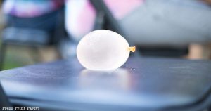 water balloon on chair for musical chairs - classic games feature pic