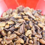 crunchy keto trail mix recipe with catalina crunch cereal, almonds, cocoa nibs, serve, and pecans.