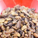 crunchy keto trail mix recipe with catalina crunch cereal, almonds, cocoa nibs, serve, and pecans.