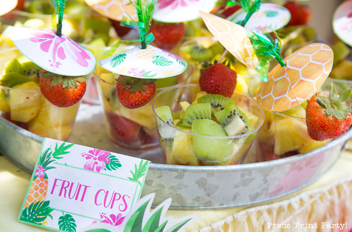 pineapple party fruit cups with umbrellas and food tent luau by press print party!