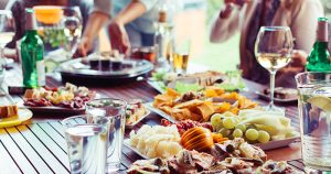 party table outside with food. 10 thank you gifts for hostess by press print party