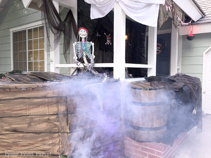 diy pirate ship- haunted pirate ship- Halloween porch decor ideas - Halloween Front porch ideas - Halloween porch decor - pirate decorations - Pirate skeleton - Mermaid skeleton - Press Print Party!