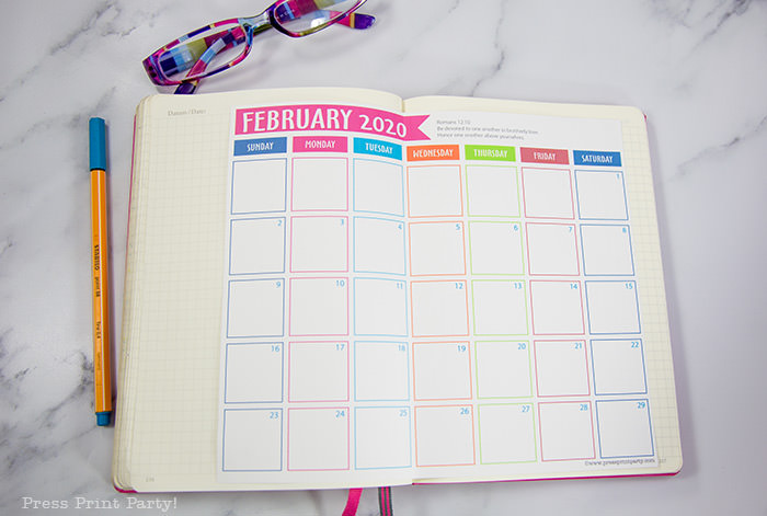 Free 2020 Calendar printable for bullet journal or household binders. With bible verses for each month. Monthly calendars to print. Glued in a notebook leuchtturm1917 February pictured. Also available January, March, April, May , June, july, august, september, october, november, december 2020