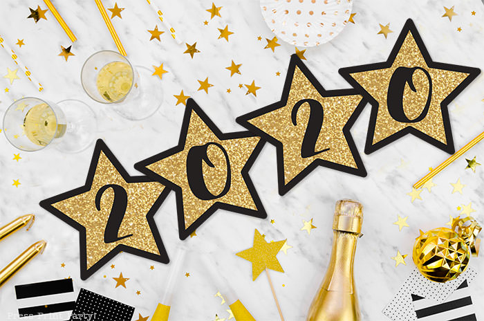 Free New year's printable banner. make for any year. For your new years eve party.all numbers included. large Gold star with black numbers. free printable by Press Print Party! Happy new year! 2020