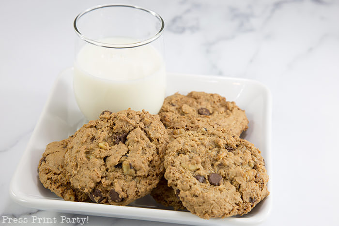 best ranger cookies recipe. chocolate chips and rice krispies cookies on plate with milk