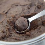 forming a chocolate truffle with a spoon. French Chocolate Truffles recipe - How to make chocolate truffles - Press Print Party!