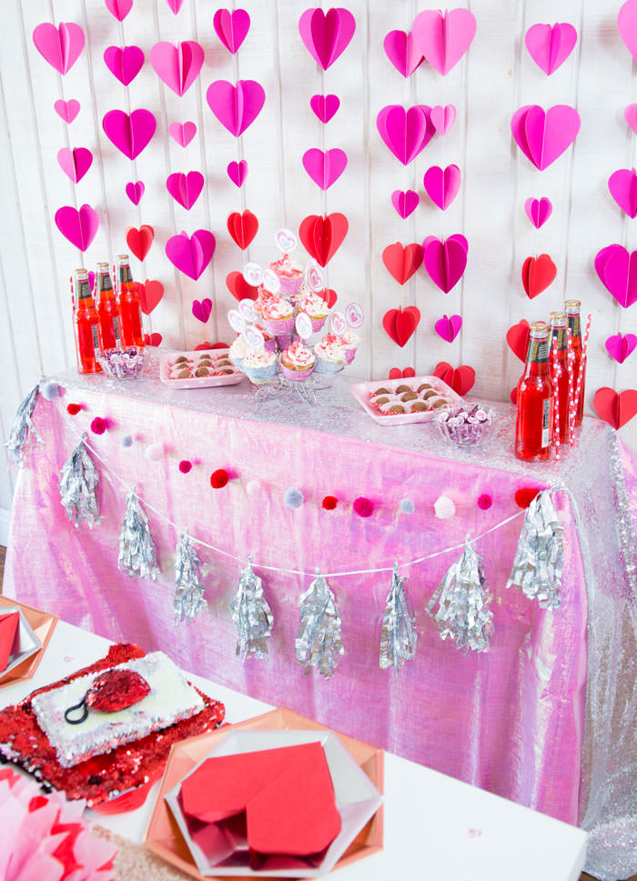 Galentines day party ideas decorations DIY, activities, favors. Happy Galentine's Day- Dessert table with Heart garland, tissue paper flowers, heart napkin, flip sequins hearts and bag, cupcakes, chocolate truffles - - Press Print Party!