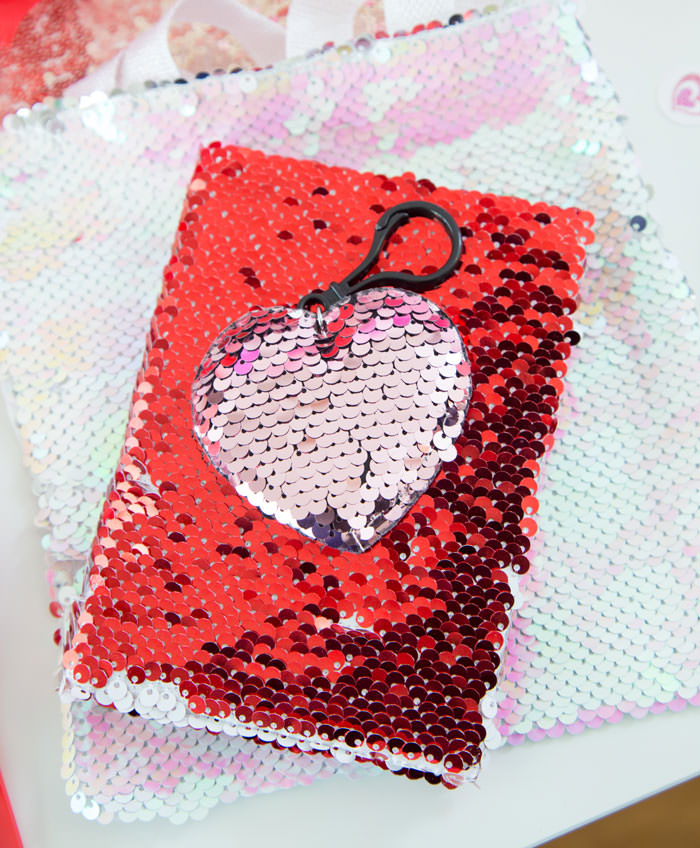 Flip sequins bag with flip sequins notebook and flip sequins heart clip keychain as party favor ideas - Galentine's Day Party Ideas for Teens - Press Print Party!