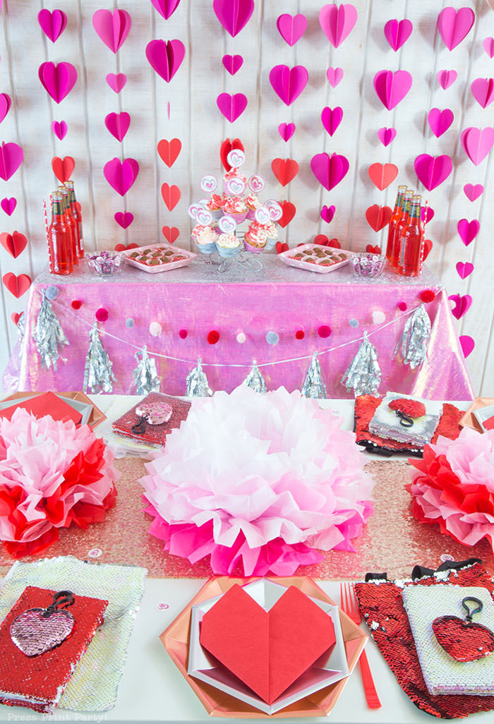 Galentines day party ideas decorations DIY, activities, favors. Happy Galentine's Day- Dessert table with Heart garland, tissue paper flowers, heart napkin, flip sequins hearts and bag, cupcakes, chocolate truffles - Press Print Party!