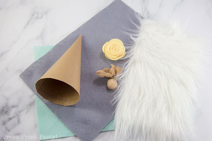 Diy gnome craft for spring no-sew craft ideas with felt flowers and, fur, cardboard cone body with hot glue gun. Press Print Party!