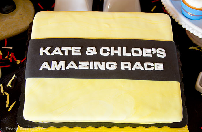 Amazing Race Cake yellow and black - The Amazing Race Party Ideas Press Print Party!